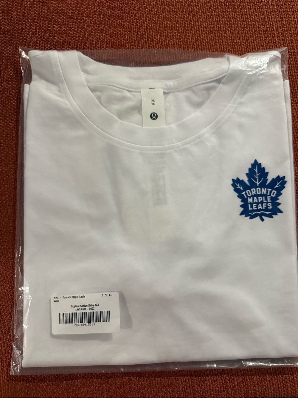 lululemon athletica White Tee with Blue Toronto Maple Leafs Emblem